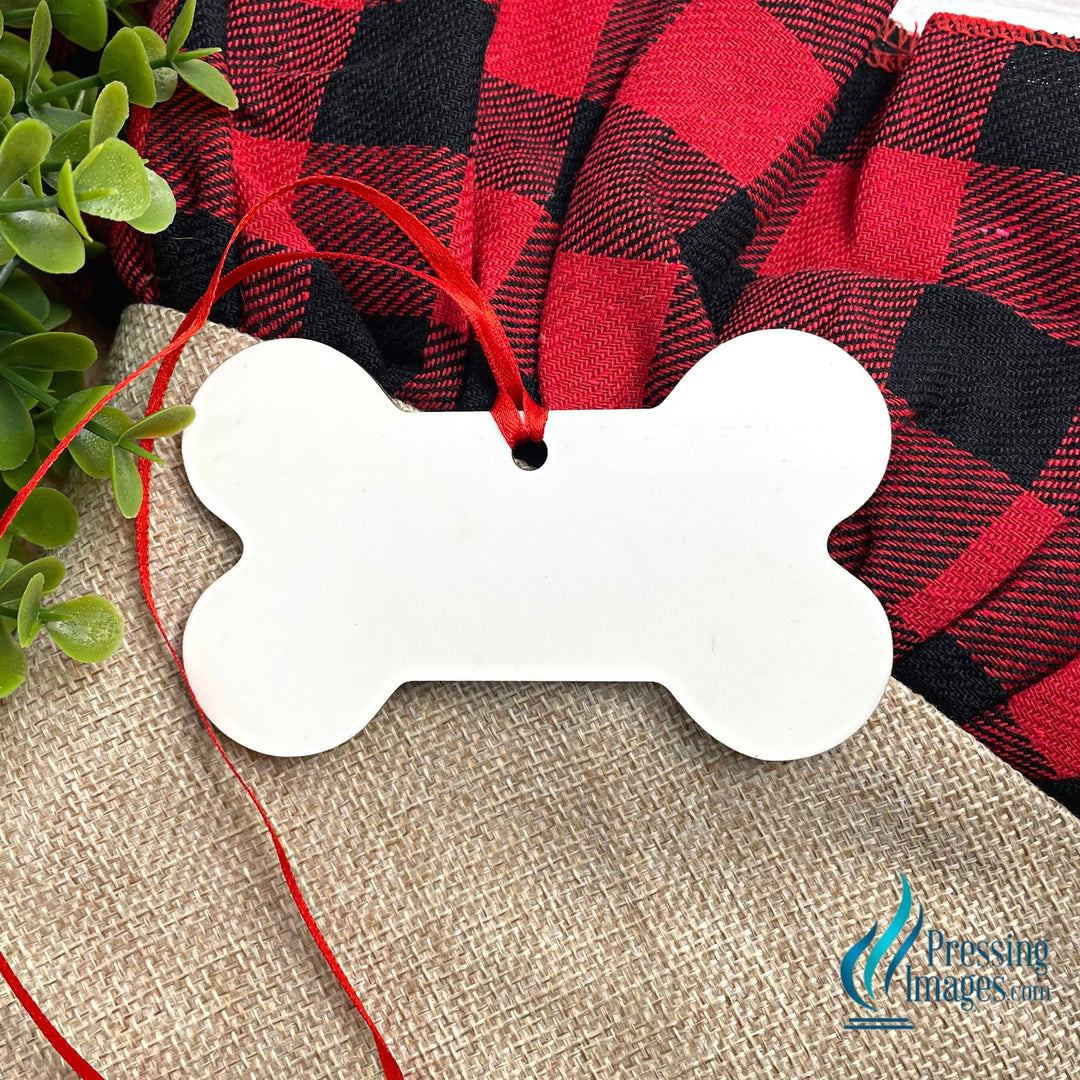 MDF sublimation ready dog bone Christmas ornament with red ribbon