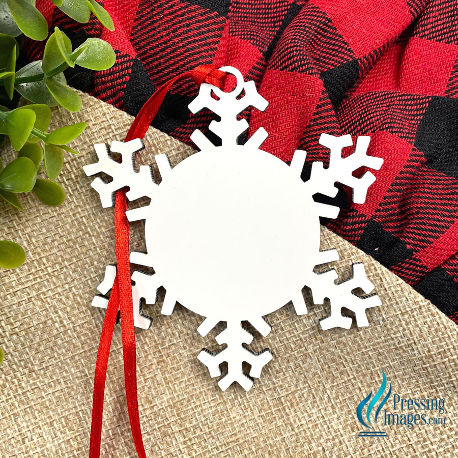 MDF snowflake with red ribbon.  Sublimation ready Christmas ornament