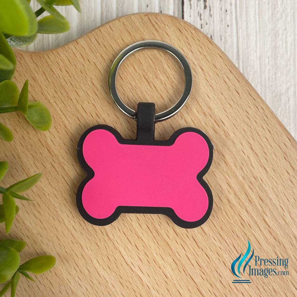 Pink dog bone keychain made of silicone for laser engraving