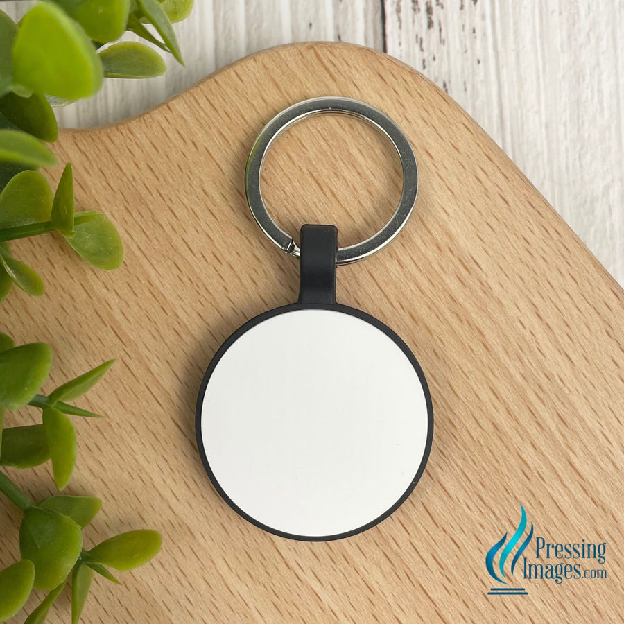 white circle keychain made of silicone 