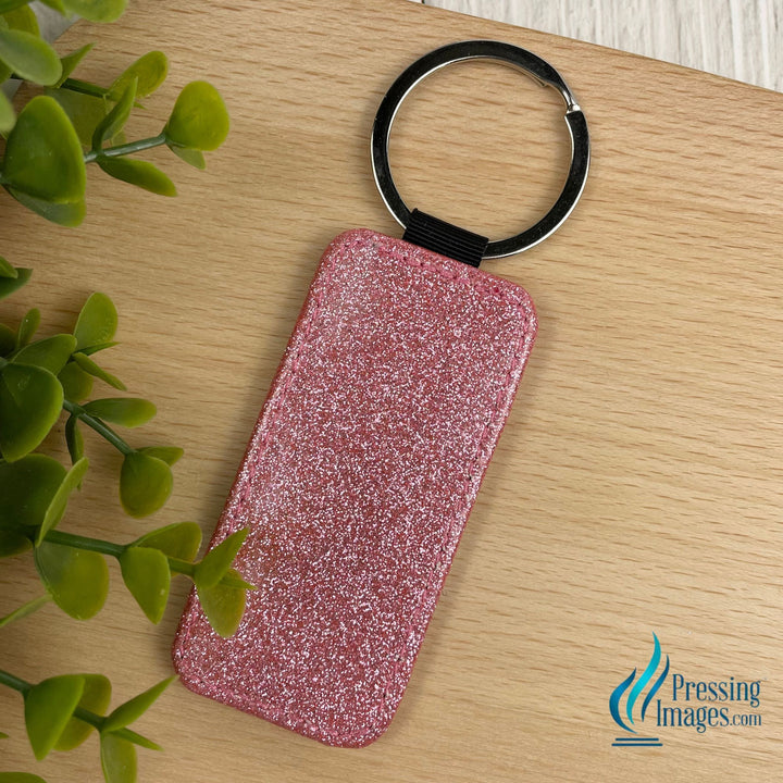 light pink glitter rectangle keychain with faux leather backing for sublimation