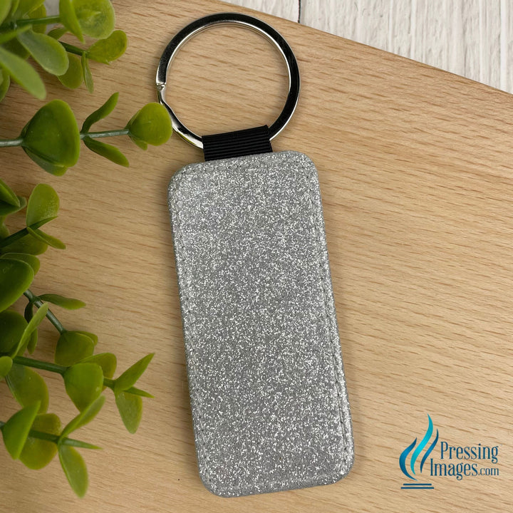 silver glitter keychain with white faux leather backing for sublimation 