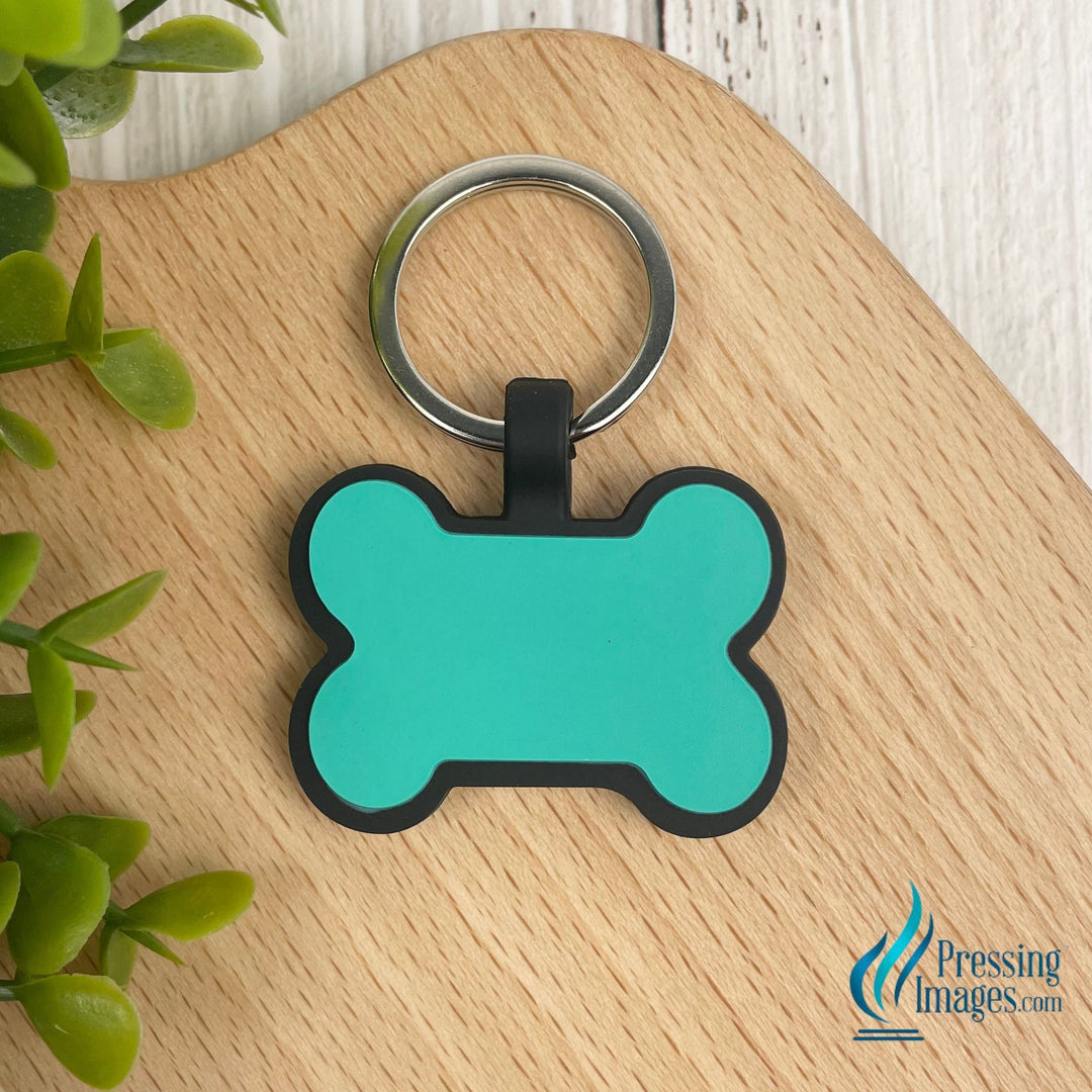 Teal silicone dog bone keychain for laser engraving
